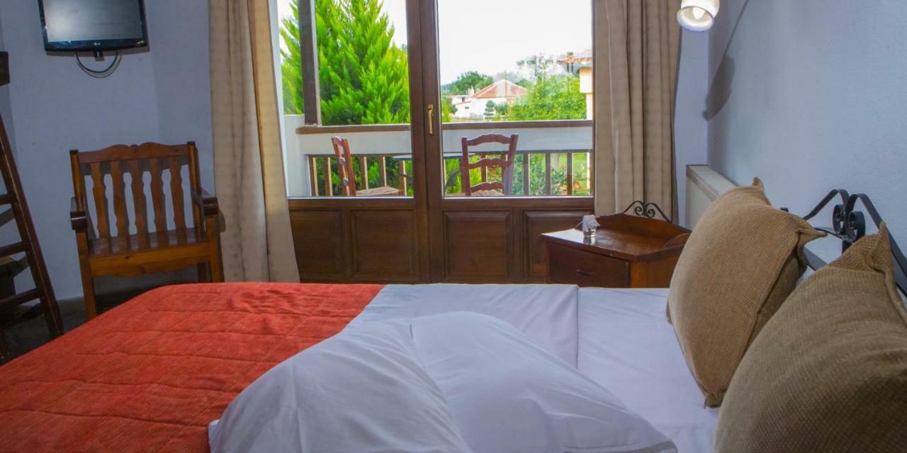 Oikoperiigitis Hotel Керкіні Екстер'єр фото